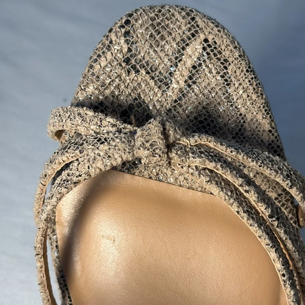 NWT Express black/tan snake print wedge sandals. Size 9. Fabric uppers.